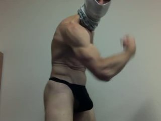 flexing masked and stroking