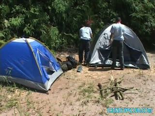 While The Others Are Out Gathering Wood For A Fire Two Stay Behind Setting Up Camp